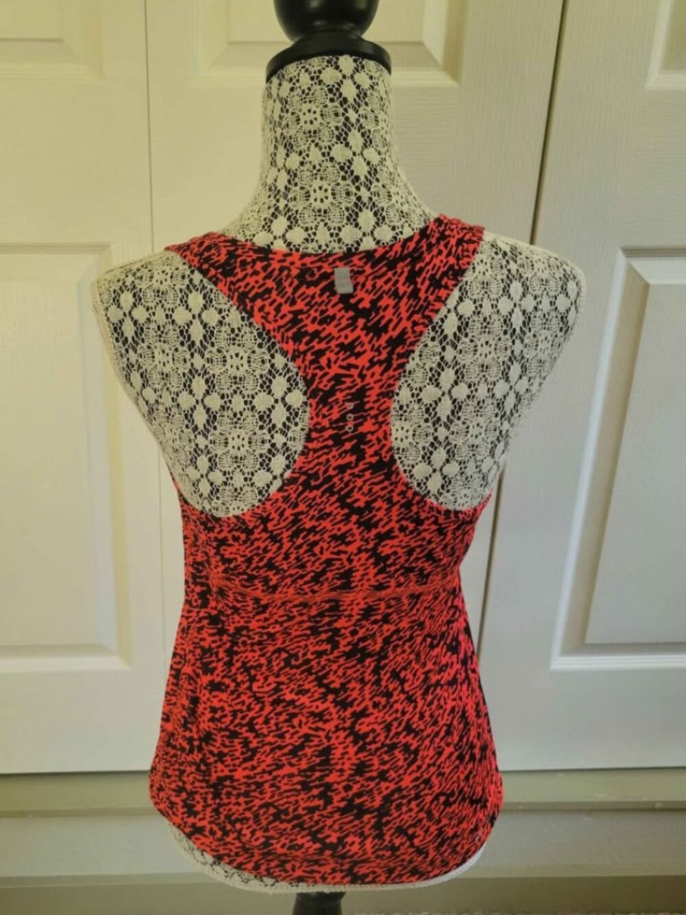 Nike Dri-Fit Racerback Running Tank Top In A Coral And Black Abstract Pattern - Picture 3 of 8